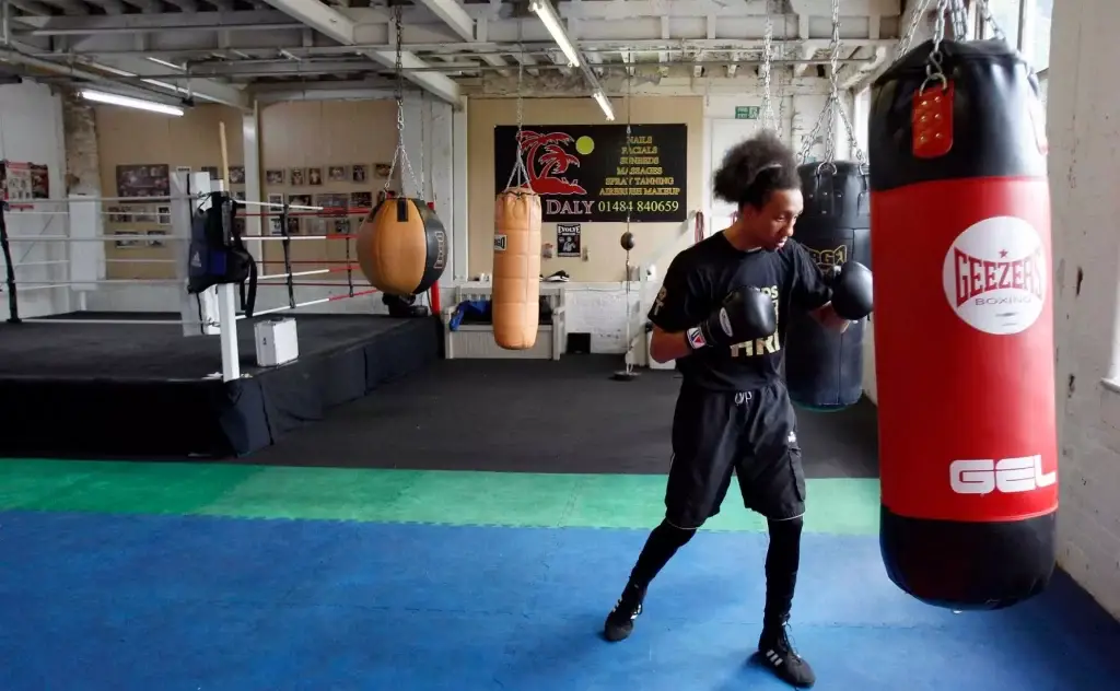 Tyrone Nurse hitting the bag inside Aston boxing club